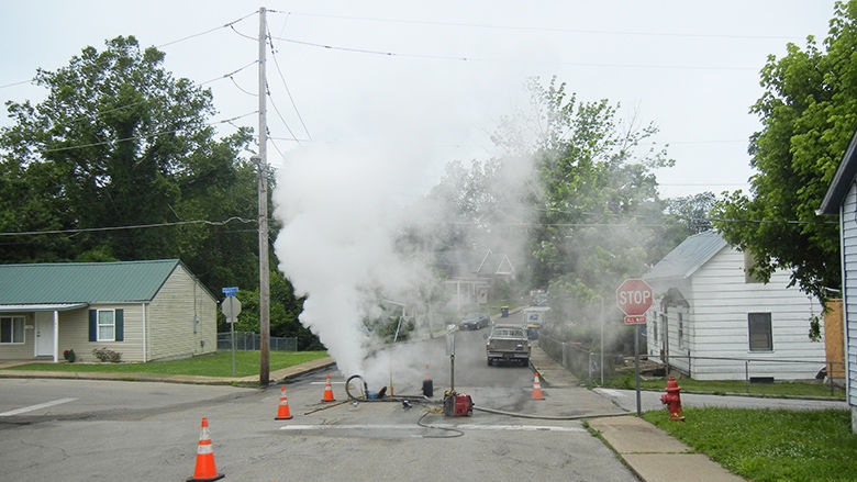 Festus sewer lining work causes steam to rise from underground